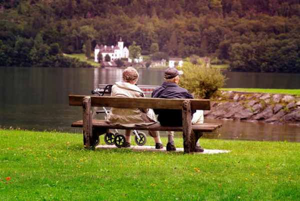 old couple sat on bench